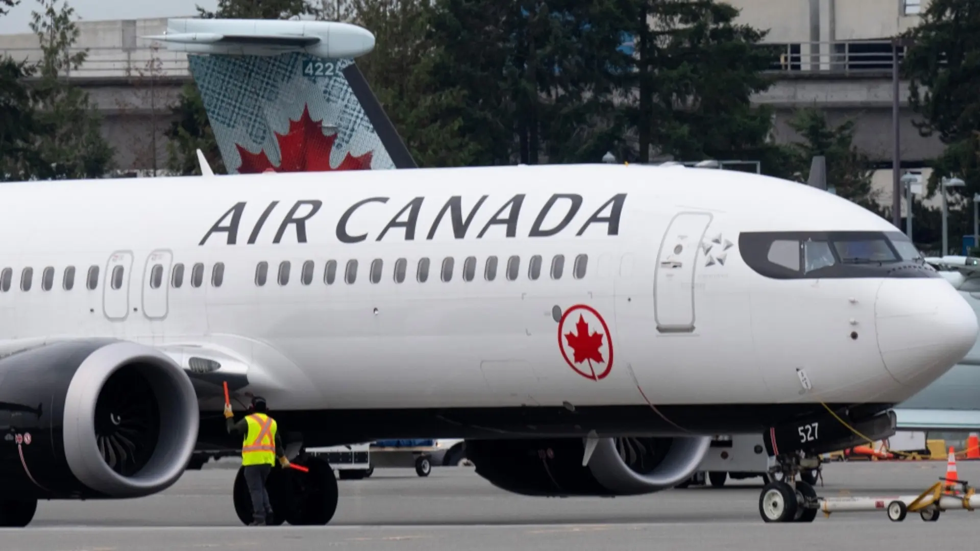 Passenger opened door during Flight Take Off in Canada, Fell on Tarmac