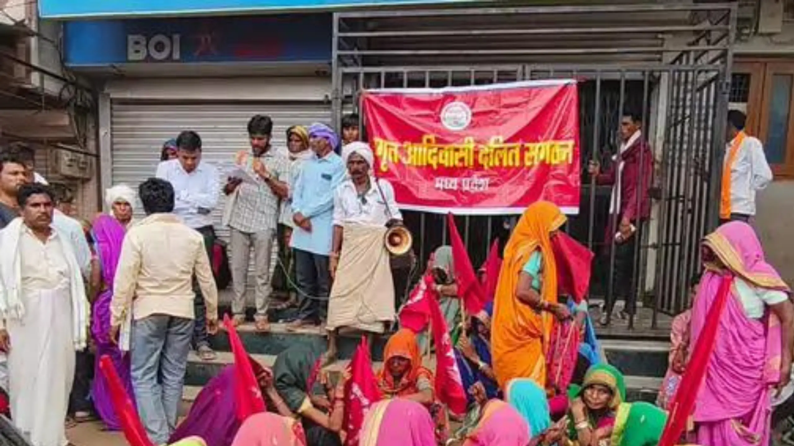 Tribal people protested at Bank of India for passbook entry and BC charges