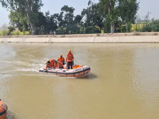 NDRF team searching body in canal