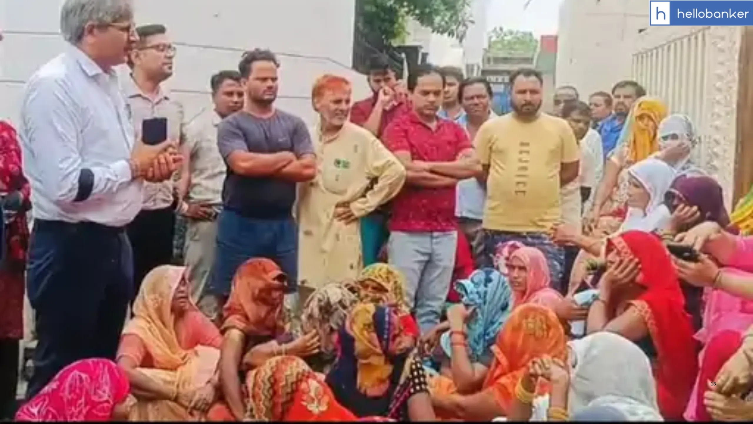 Women locked the main gate of UP Gramin Bank in Bulandshahr