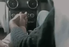 Bank Officer Travelling in Car with his Colleague