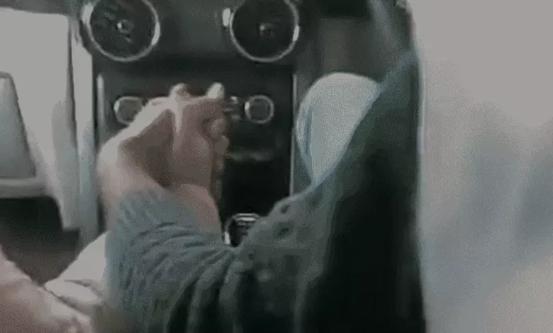 Bank Officer Travelling in Car with his Colleague