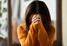 Image of woman with face hidden