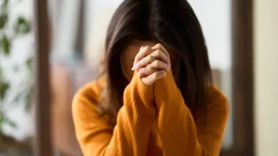 Image of woman with face hidden