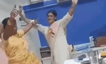 SBI women dancing inside office