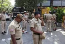 Four people have been arrested in Bengaluru for allegedly stripping and assaulting a woman over non repayment of loan.