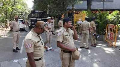 Four people have been arrested in Bengaluru for allegedly stripping and assaulting a woman over non repayment of loan.