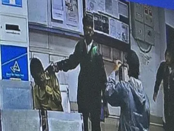 Robbers threaten Bank employees with gun